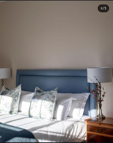 Ένα ή περισσότερα κρεβάτια σε δωμάτιο στο Hydrangea Guest House