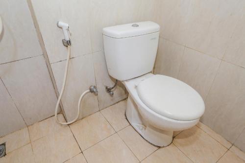Ένα μπάνιο στο OYO 93948 Bunda Rachma Rooms