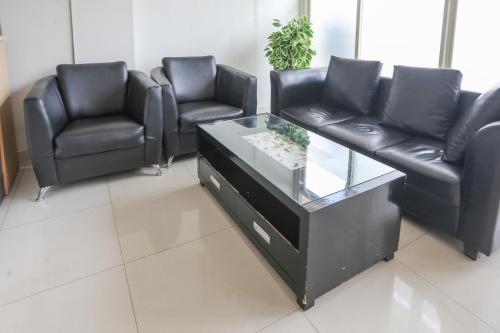 Χώρος καθιστικού στο OYO 93948 Bunda Rachma Rooms