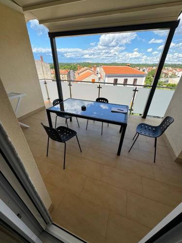 Μπαλκόνι ή βεράντα στο Funtana Appartements an der 1 Reihe vom Meer