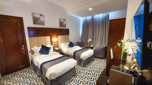 Katil atau katil-katil dalam bilik di Golden Dune Residential Unit - Almalaz
