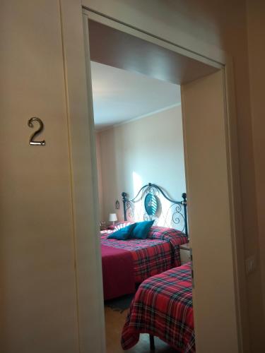 Katil atau katil-katil dalam bilik di Bed And Breakfast Loriana