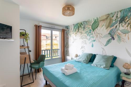 Katil atau katil-katil dalam bilik di Les pins 205 - Appt 400m de la plage