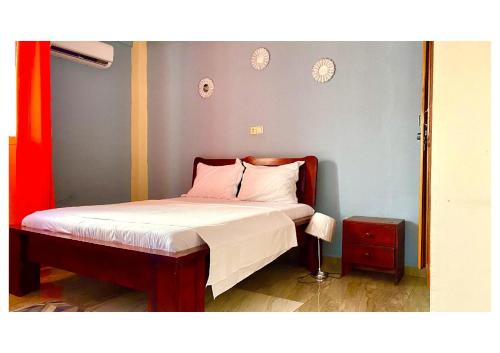 Llit o llits en una habitació de Le Sable