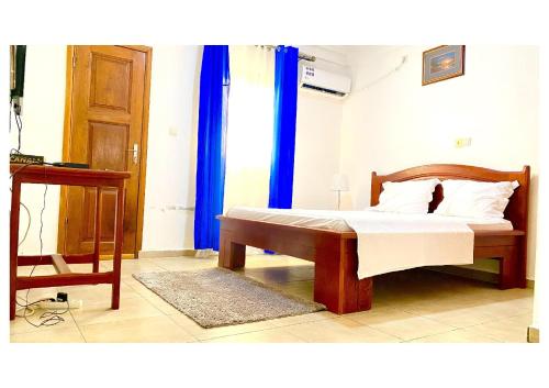 Llit o llits en una habitació de Le Sable