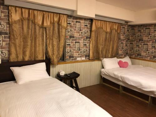 Tempat tidur dalam kamar di Honey Prince