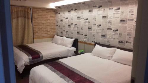 Tempat tidur dalam kamar di Honey Prince