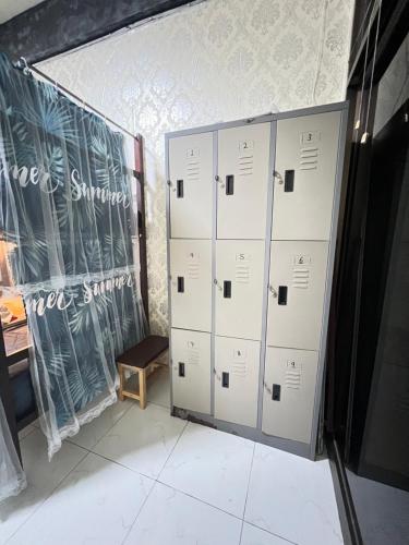 a group of lockers in a room with a table at BT @ Haadrin in Haad Rin