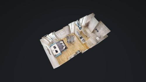 - une vue de tête sur une maison avec plan d'étage dans l'établissement 152 Suite Sylvie - Superbe Appartement à Paris, à Paris