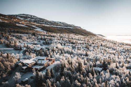 an aerial view of a house on a mountain at Buustamons Fjällgård in Åre