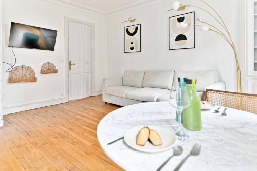 Appartement Haussmannien lumineux et central- II