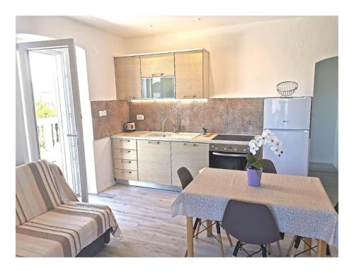 Η κουζίνα ή μικρή κουζίνα στο Apartments Darka