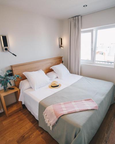 Hotel Boutique Lamar de Suancesにあるベッド
