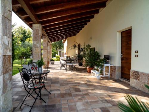 an outdoor patio with a table and chairs at Holiday Home Rêve d'Or by Interhome in Citta' Sant'Angelo