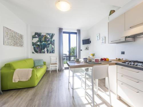 A kitchen or kitchenette at Apartment Le Margherita - SLR266 by Interhome