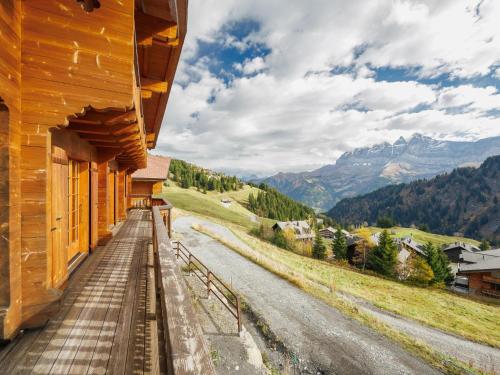 a house with a view of a mountain at Chalet Godfrey by Interhome in Les Crosets