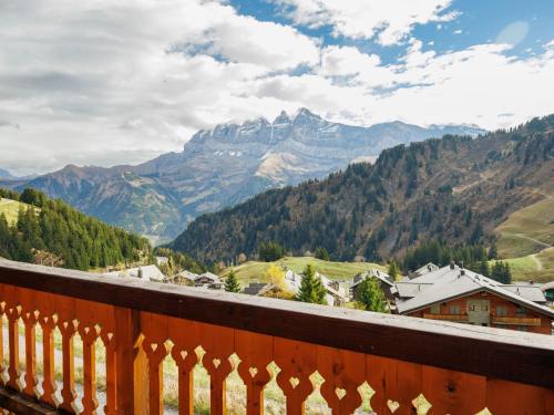 a view from a balcony of a mountain valley at Chalet Godfrey by Interhome in Les Crosets