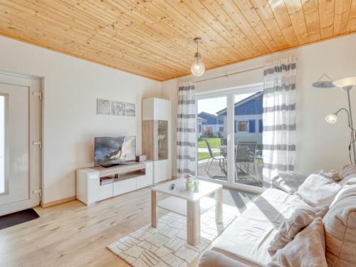 TV a/nebo společenská místnost v ubytování Holiday Home Sundlicht by Interhome