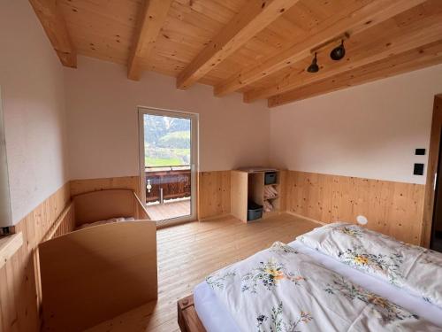 Katil atau katil-katil dalam bilik di Holiday Home Hettegg Lehen by Interhome