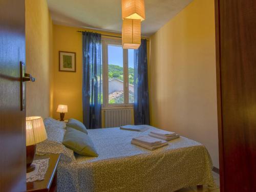 Postel nebo postele na pokoji v ubytování Holiday Home Nide by Interhome
