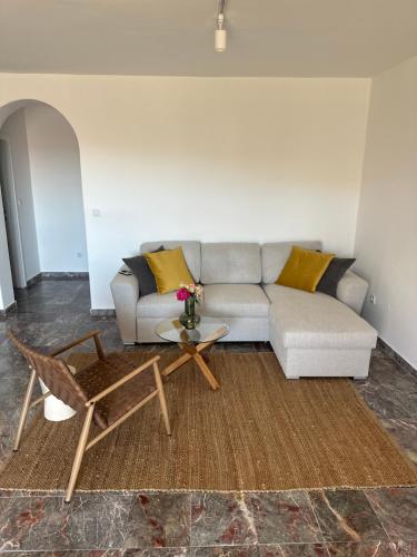 a living room with a couch and a coffee table at Villa Lulu in Orebić
