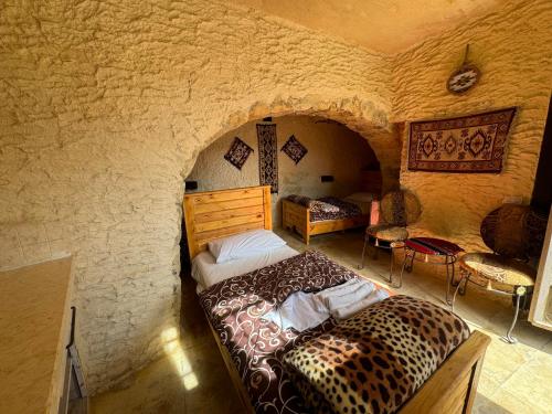 Postel nebo postele na pokoji v ubytování Dana Tower Hotel