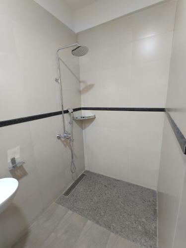 Un baño de Jangala Baga Beach - French welcome, tropical garden, close to the beach