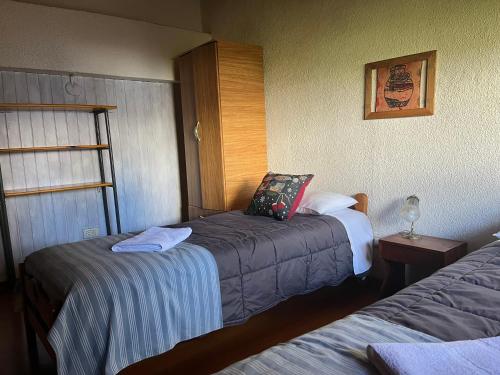 Postel nebo postele na pokoji v ubytování Casa Campo