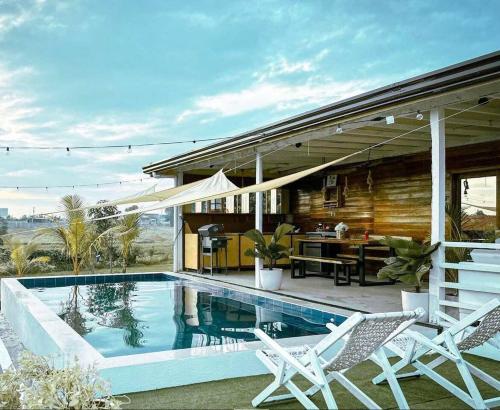 Kolam renang di atau dekat dengan Rancho Oco Mahogany Villa with Swimming Pool