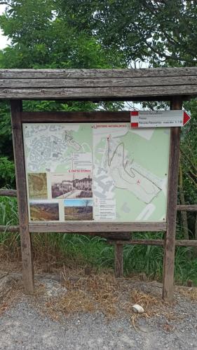 a wooden sign with a map on it at Al Grillo in Carrù