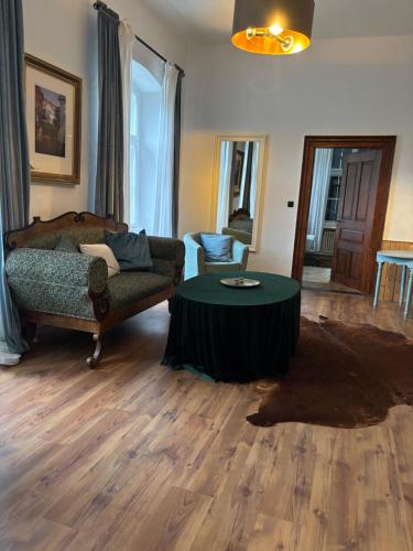 Posezení v ubytování Gutsherren Wohnung