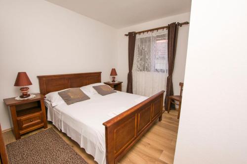 Postel nebo postele na pokoji v ubytování Apartment Grdelin