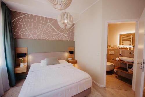 Una cama o camas en una habitación de Hotel-Restaurant Haselhoff