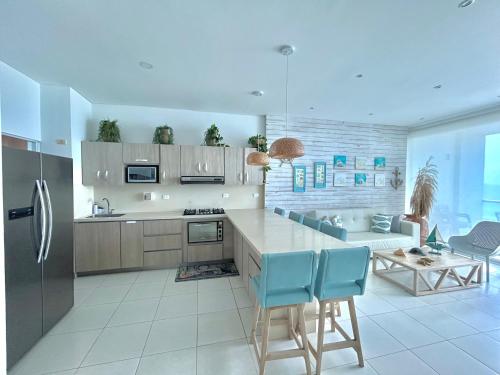 Kuchyň nebo kuchyňský kout v ubytování Apartamento con vista al mar en Coveñas