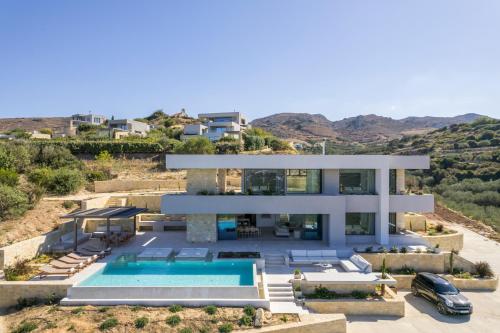 an aerial view of a house with a swimming pool at Youphoria Sea View Villas in Kissamos