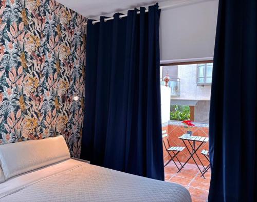 Katil atau katil-katil dalam bilik di Guadalupe Cozy Inns