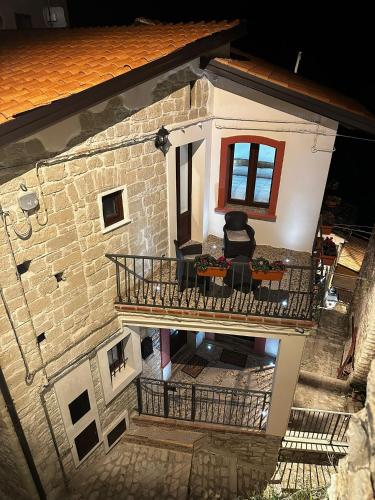 an overhead view of a house with a balcony at Dimora Forgione B&B - Pietrelcina in Pietrelcina