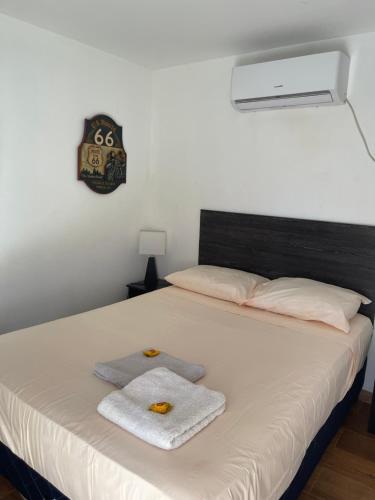 Ένα ή περισσότερα κρεβάτια σε δωμάτιο στο Monoambiente