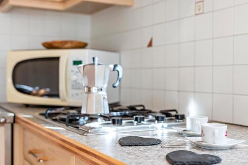 Kuchyň nebo kuchyňský kout v ubytování Apartments Campagnola