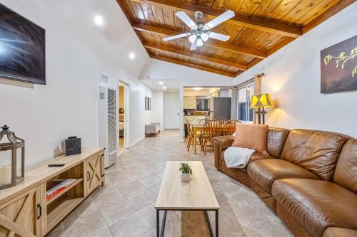 a living room with a couch and a table at Mimi's & Nana's Beach House in San Diego