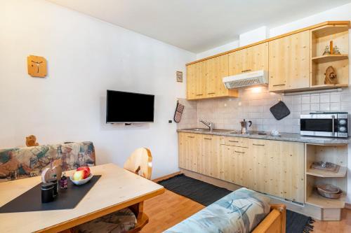 Kuchyň nebo kuchyňský kout v ubytování Apartments Campagnola