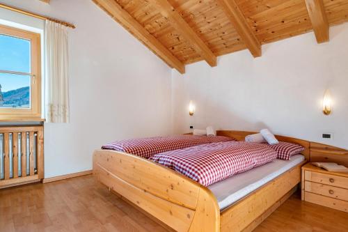 Postel nebo postele na pokoji v ubytování Apartments Campagnola