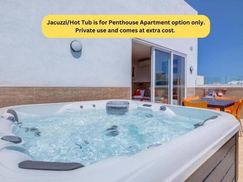 a jacuzzi tub is for per bathroom apartment option only at Bayside A Apartments in St Julian's