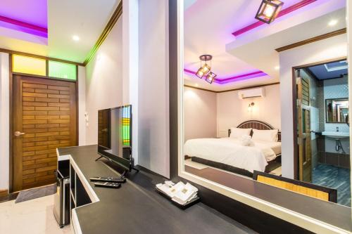 Postel nebo postele na pokoji v ubytování Loft Vintage Chalet resort