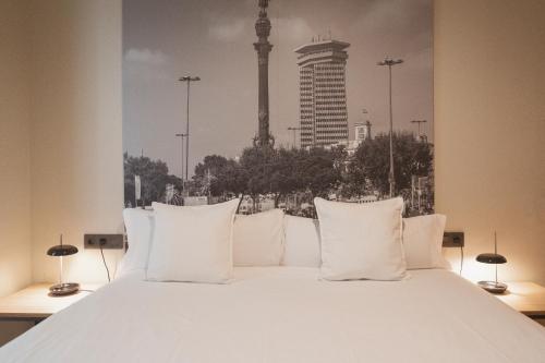 Posteľ alebo postele v izbe v ubytovaní Apartments Hotel Sant Pau