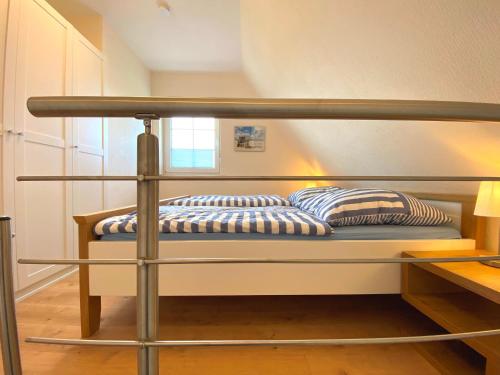 En eller flere senge i et værelse på Friesenhaus für 2