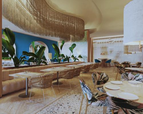 a restaurant with tables and chairs in a room at Dreams Playa Esmeralda Resort & Spa - All Inclusive in Miches