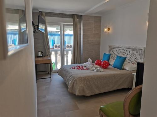 Postel nebo postele na pokoji v ubytování Hotel CALPE