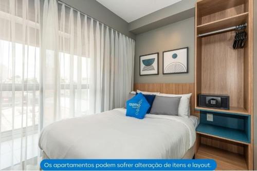 Ένα ή περισσότερα κρεβάτια σε δωμάτιο στο Roomo Transamerica SP Alto do Ipiranga