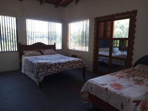 Katil atau katil-katil dalam bilik di Sharing Home I